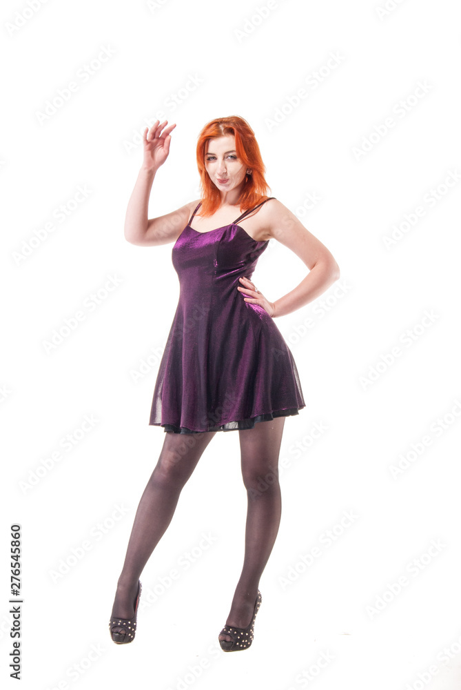 young woman in tight black dress on white background young woman in tight black dress on white background