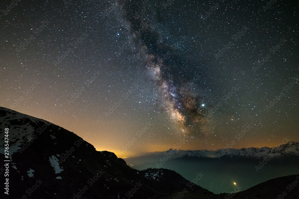 Milky way galaxy stars over the Alps, Mars and Jupiter planet, snowcapped mountain range, astro night sky stargazing - obrazy, fototapety, plakaty 