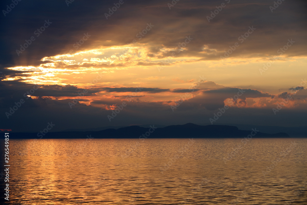 Sonnenuntergang am Meer vor der Küste Neuseeland Sonnenuntergang am Meer vor der Küste Neuseeland