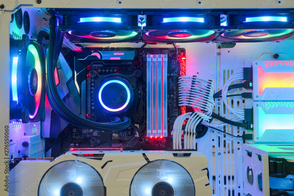 Close-up and inside Desktop PC Gaming and Cooling Fan CPU system with  multicolored LED RGB light show status on working mode, interior PC Case  technology background Photos | Adobe Stock