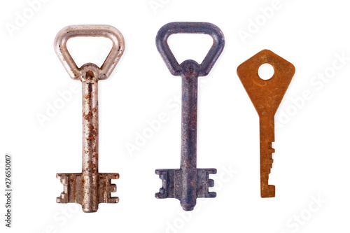 Old rusty door key isolated on white. three key set