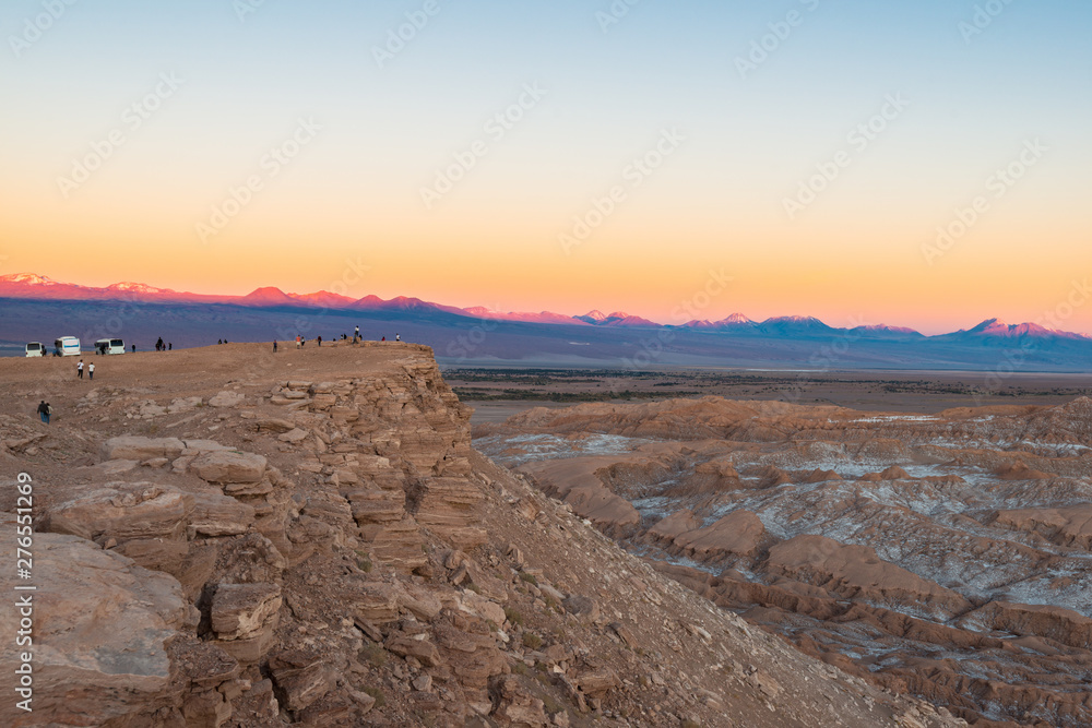 Tourist visiting the Moon Valley at the Salt Mountain Range, San Pedro de Atacama, Atacama Desert, Chile