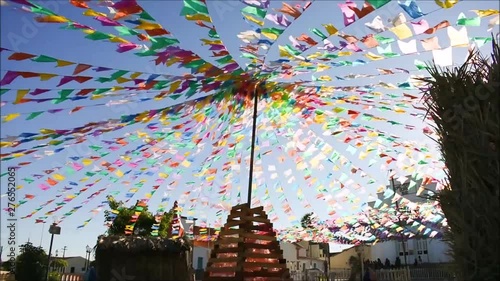 Typical colorful flags blowing in the wind - they are used for decoration at the June Festivals (aka festas de Sao Joao), popular festivities in Brazil (Oeiras, Brazil)