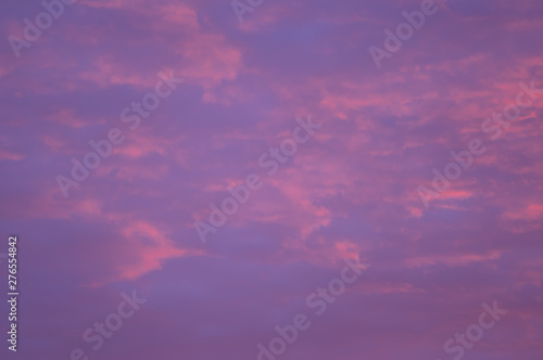 Before sunrise. Beautiful summer morning sky width colorful clouds. Estonia.
