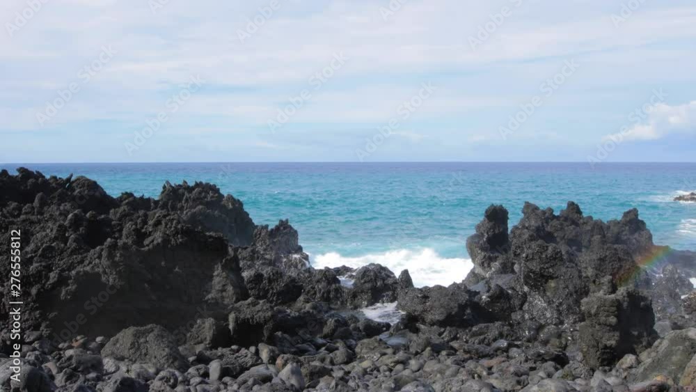 Beautiful blue ocean and large waves crashing into shore on Hawaii. Beautiful blue ocean and large waves crashing into shore on Hawaii.