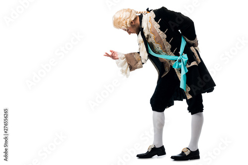 Canvas Print handsome victorian gentleman in wig gesturing while bowing down isolated on whit