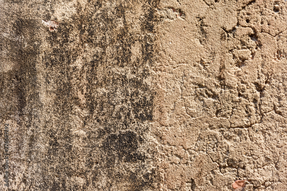 Old gray cement or concrete wall. Grunge plastered stucco textured background. Old gray cement or concrete wall. Grunge plastered stucco textured background.