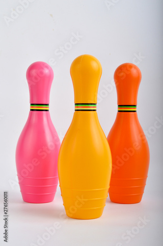 Colorful plastic skittles of toy bowling 