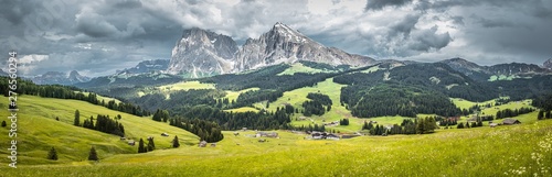 Seiser Alm  Alpe di Siusi  with Langkofel mountain at a cloudy day  Italy