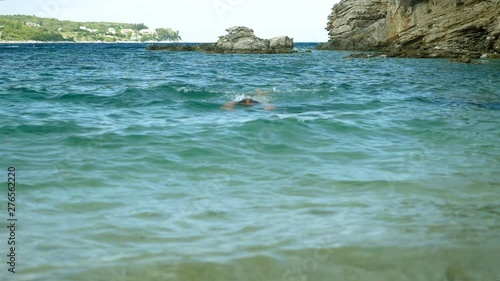 Wallpaper Mural Adult man swimming the breaststroke in Mediterranean sea. Greece. Slow motion. HD Torontodigital.ca