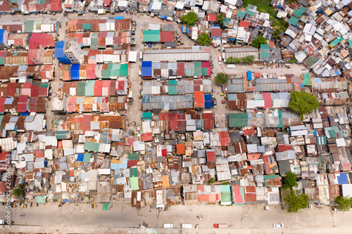 Streets of poor areas in Manila. The roofs of houses and the life of people in the big city. Poor districts of Manila, view from above. Manila, the capital of the Philippines.