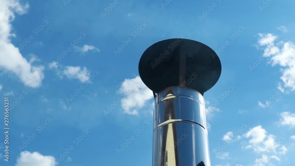 industrial smoke from chimney on blue sky, problem of global warming on the plane industrial smoke from chimney on blue sky, problem of global warming on the plane