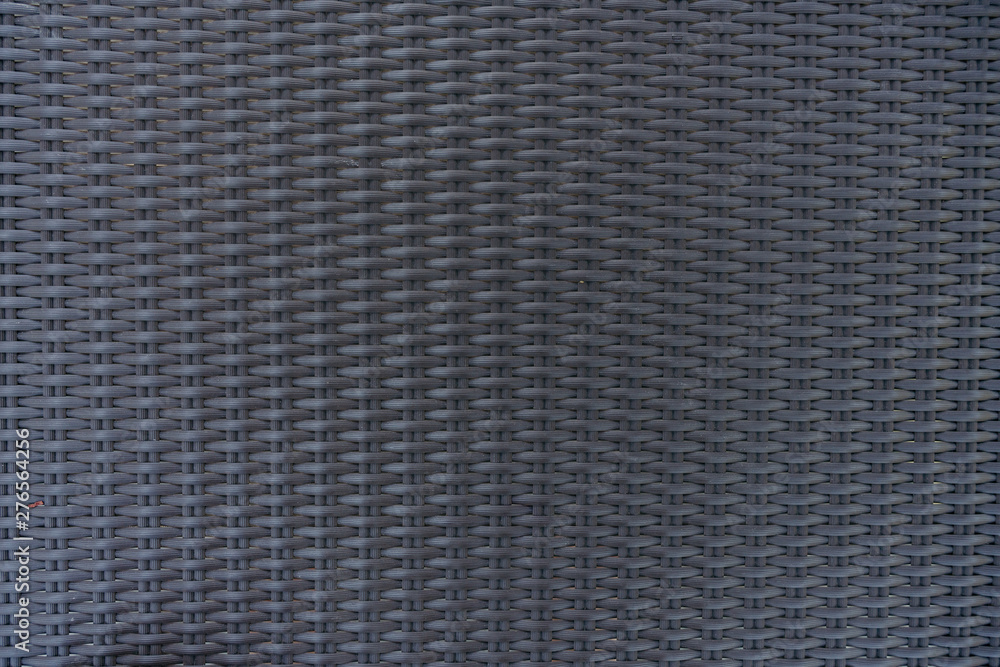 Gray brown synthetic rattan texture weaving background Gray brown synthetic rattan texture weaving background