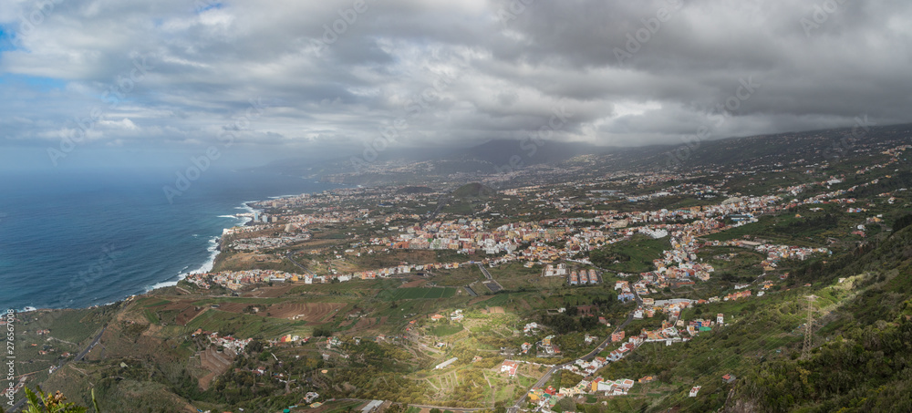 This panoramic photograph, taken at a Mirador de El Lance, shows the north coast of Tenerife and the Orotava Valley. Tenerife, Canary Islands. Wide angle lens panorama
