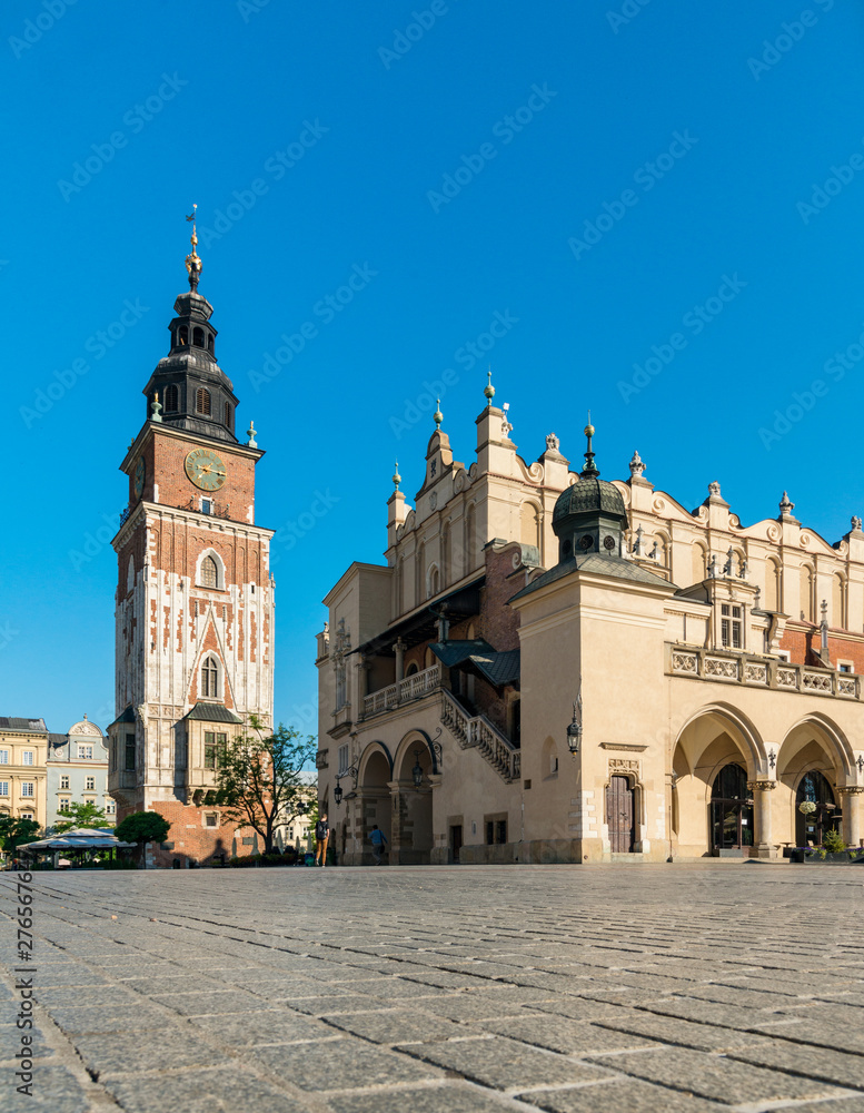 Main market square, cloth hall and town hall tower in Krakow