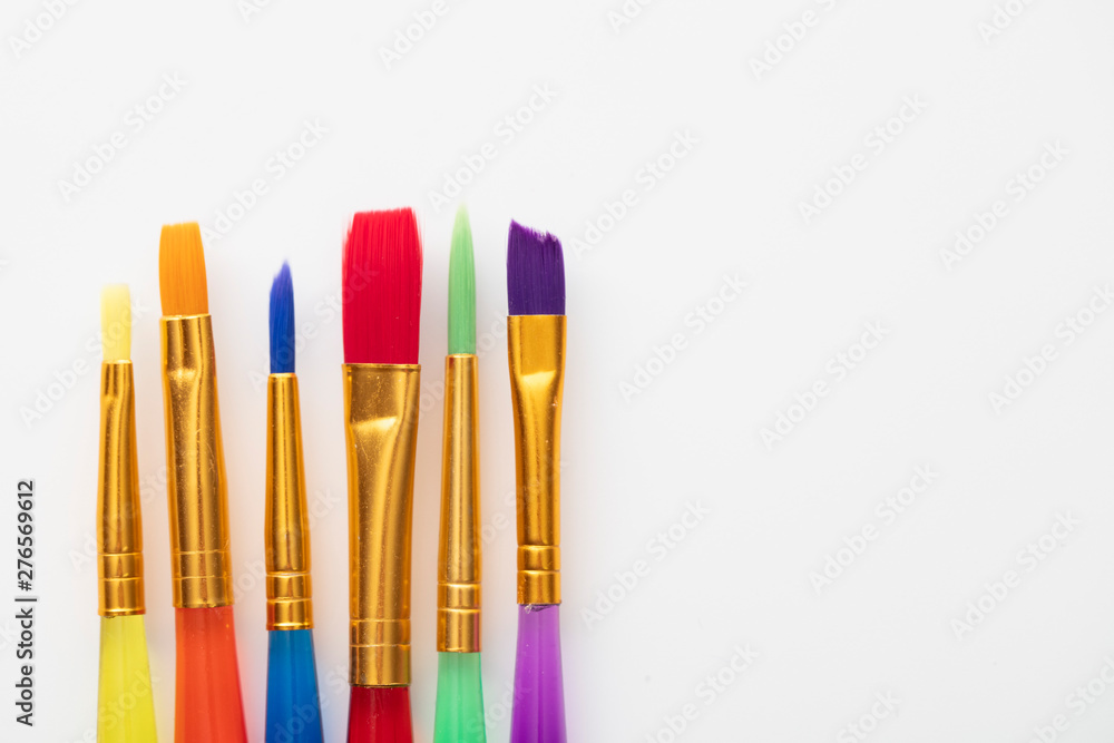 Colourful creative paintbrush art supply background Colourful creative paintbrush art supply background