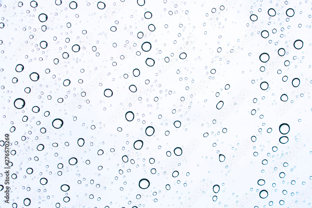 sky view through car window with rain drops. sky view through car window with rain drops.