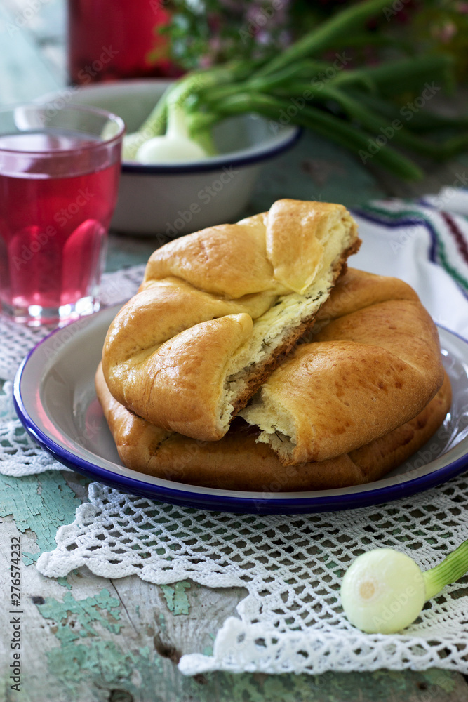 Traditional homemade Romanian and Moldovan pies - Placinta, served with wine. Rustic style. Traditional homemade Romanian and Moldovan pies - Placinta, served with wine. Rustic style.