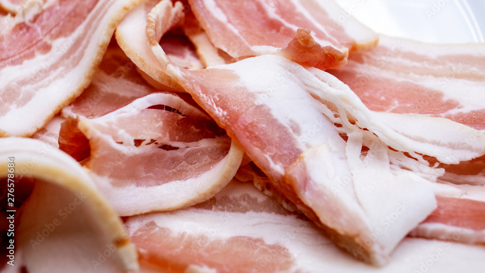 Slices of bacon, salt-cured pork