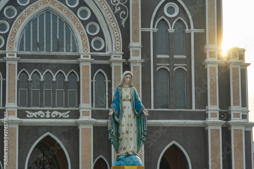 Our lady, The Blessed Virgin Mary with the cathedral behind. photo