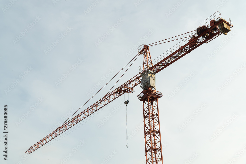Construction crane with blue sky background. Construction crane with blue sky background.