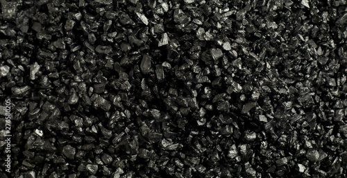 Panorama background texture of black Hawaiian Salt