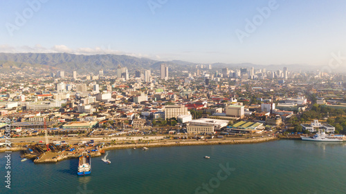 Cityscape in the morning. The streets and houses of the city of Cebu  Philippines  top view. Panorama of the city with houses and business centers.