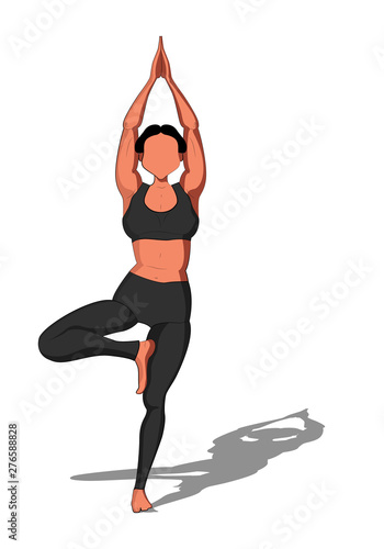 beautiful girl exercising yoga. Yoga asana Vrikshasana Tree Pose 