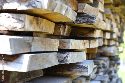 Stacked dry boards for making wooden products. Small depth of field.