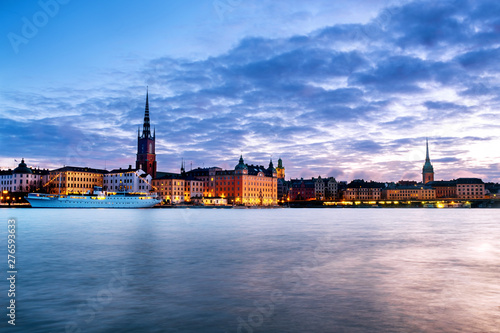 View of Gamla Stan in Stockholm, Sweden with landmarks like Riddarholm Church during the sunrise
