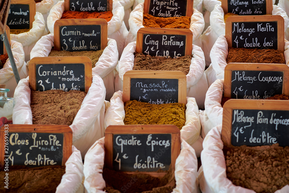 Spices and herbs at the traditional street market in St. Tropez, France. Spices and seasonings