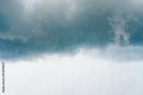 Thunder grey sky with blue clouds and rain. Great background © Nataliya