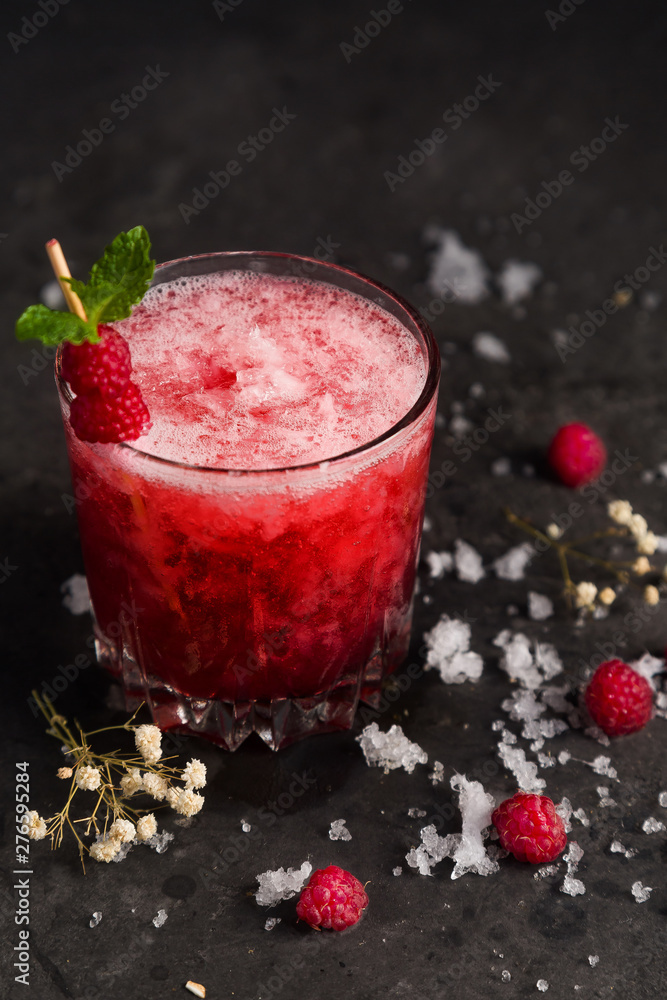 berry cocktail for a bar in the summer with ice and raspberry syrup is very tasty and beautiful berry cocktail for a bar in the summer with ice and raspberry syrup is very tasty and beautiful