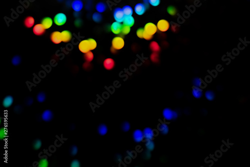 Rainbow overlays isolated on black background. Creative defocused bokeh lights, colorful elements artwork design idea