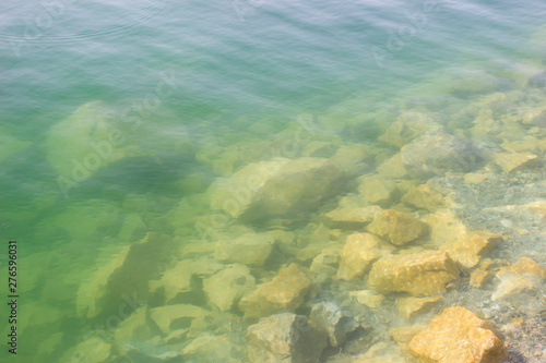 Texture of water surface sun water stones waves - underwater world © alexey_m