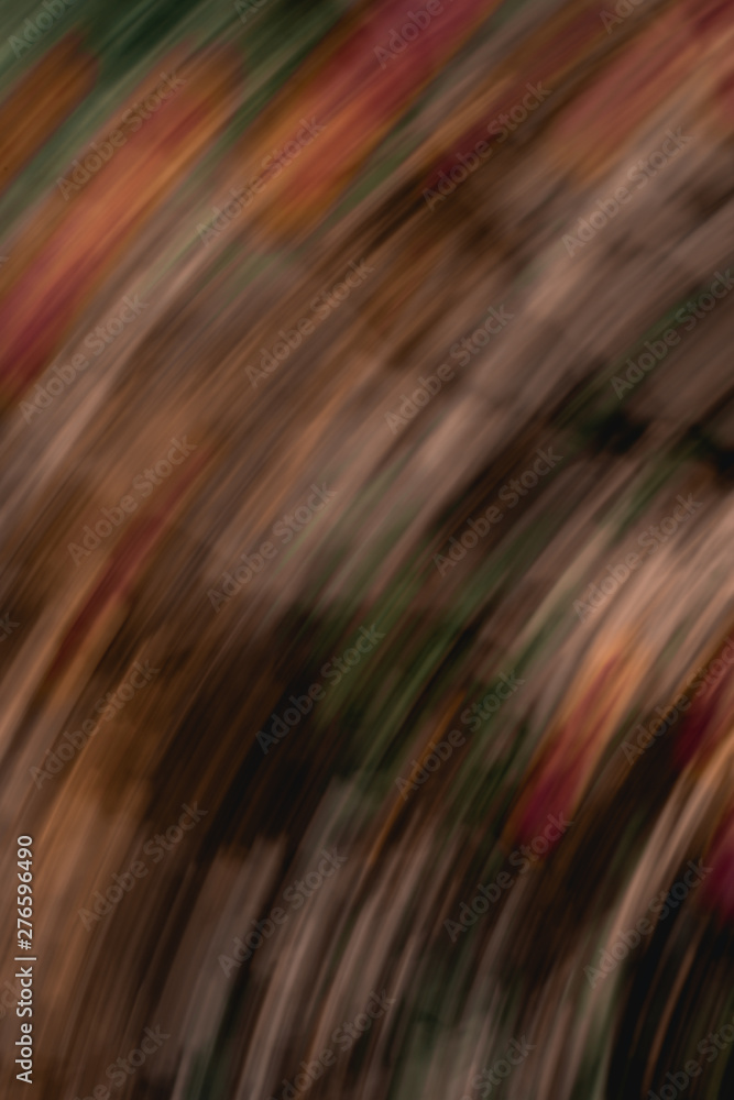 Defocused dynamic abstract background. Motion effect decorative backdrop. Natural summer blurry light and dark green orange texture. Fresh no focus plant leaves creative wallpaper Defocused dynamic abstract background. Motion effect decorative backdrop. Natural summer blurry light and dark green orange texture. Fresh no focus plant leaves creative wallpaper