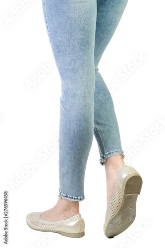 flats on the feet, shoes on a white background