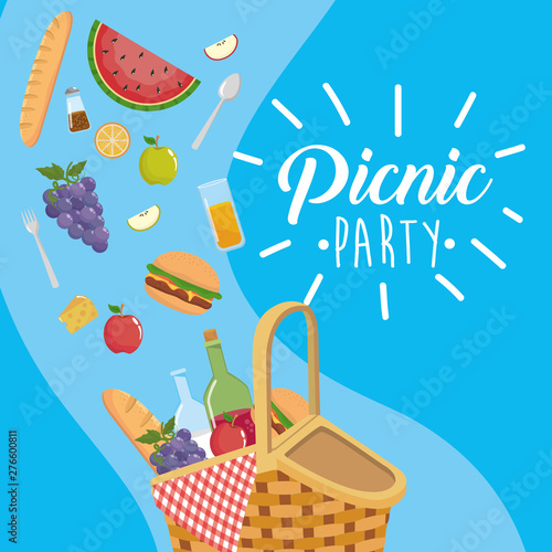 hamper with wine bottle and hamburger with orange juice