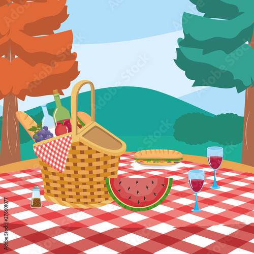 hamper with milk and wine bottle with bread