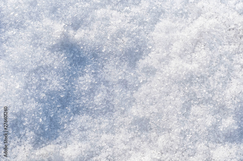 the first snow, the texture of the snow, snow abstract background with blue tint