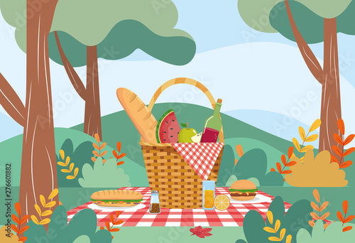 hamper with bread and wine bottle with watermelon