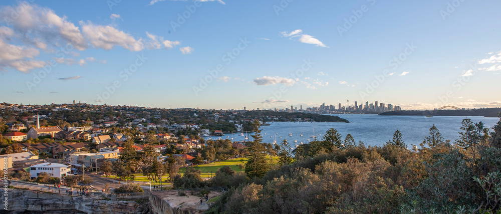 Sydney Australia. Watson Bay gaps bluf. With skyline of Sidney in the back. Panorama. Coast.