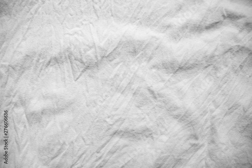 texture background cotton folds of white fabric