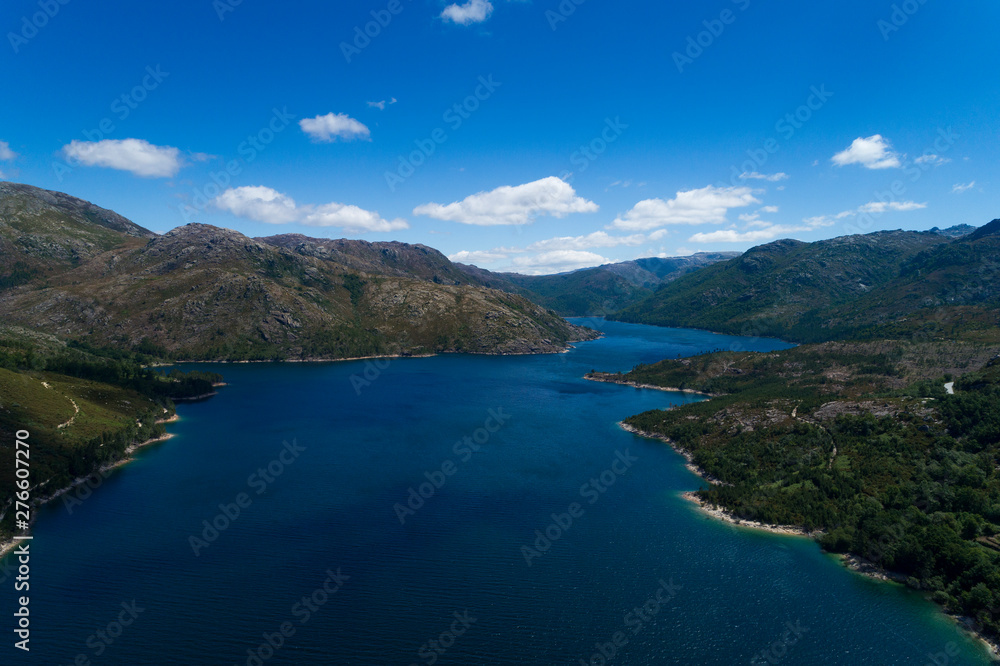 Aerial scenic view of the lake at the Vilarinho das Furnas Dam, Peneda Geres National Park, in Portugal.