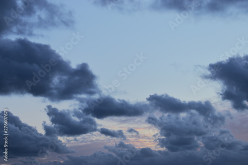 Sunset. Blue sky with blue and orange clouds. nature background