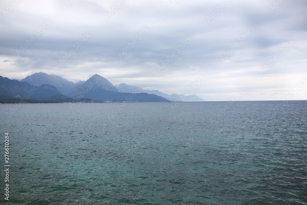 Sea and mountains in Turkey in cloudy weather Sea and mountains in Turkey in cloudy weather