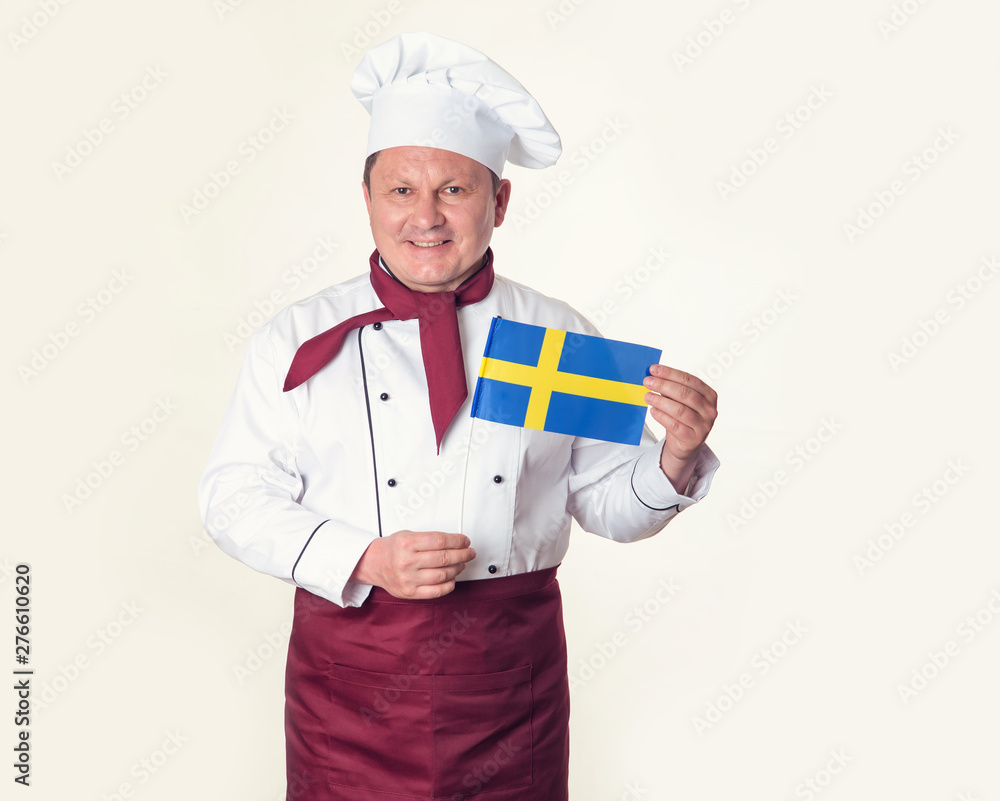 Chef cook in uniform with flag of Sweden. Scandinavian cuisine. Chef cook in uniform with flag of Sweden. Scandinavian cuisine.