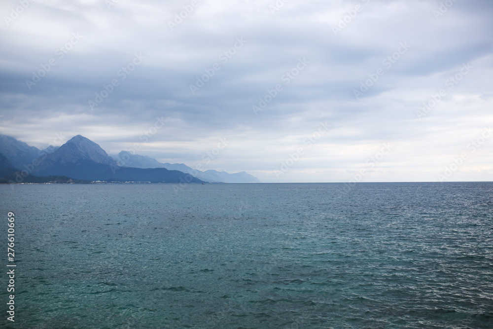 Sea and mountains in Turkey in cloudy weather