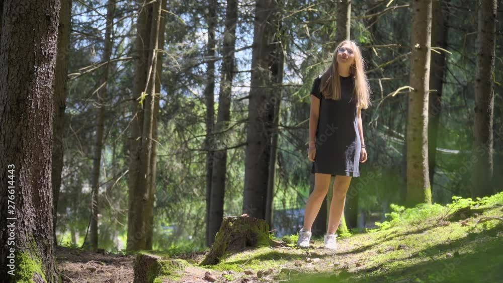 Woman Walking in Forest Woman Walking in Forest