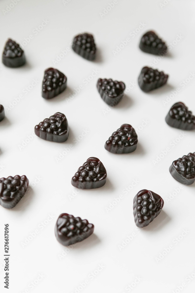 Group of Elderberry Gummies on White Background, Top View, Vitamins and Supplement Gummy, Natural Immunity Group of Elderberry Gummies on White Background, Top View, Vitamins and Supplement Gummy, Natural Immunity